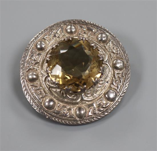 A Scottish celtic design silver and citrine cloak brooch, 38mm.